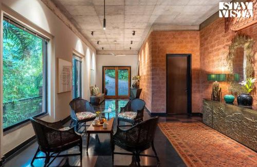 Moira Villa | StayVista at Moira by the River with Bonfire, BBQ