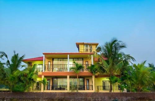 Anjanvel Villa | StayVista at Ocean Breeze with Bonfire & Pool