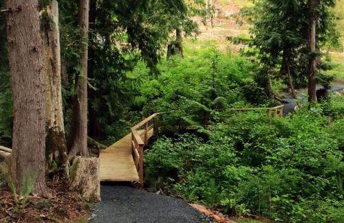 Powell River RV Rental | Steps from the Beach Off-grid Creekside Campsite