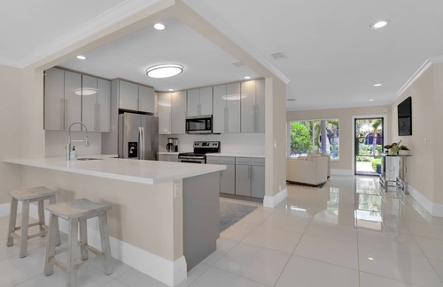 Boca Raton House | Steps from the beach, heated pool, and ocean sunrises from your patio
