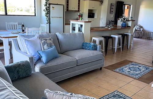 North Ward Apartment | Steps from The Strand 2BR & 2BA Riveria Retreat, Pool & Castle Hill Views