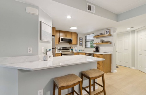 Amelia City Condo | Steps to the Pool | 2 King Beds with Private Patio