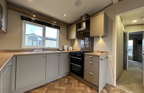 St. Andrews House | Stewarts Resort Lodge 31 - a lodge that sleeps 4 guests in 2 bedrooms