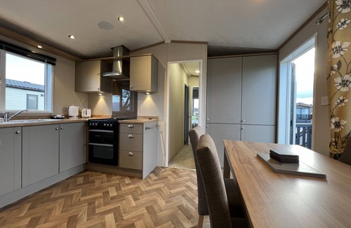 St. Andrews House | Stewarts Resort Lodge 31 - a lodge that sleeps 4 guests in 2 bedrooms