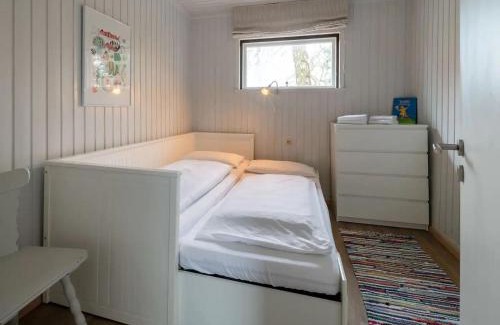 Suederhafen Apartment | Stilvolles Kapteins Cottage mit Kamin - Inge