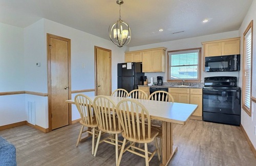 Buxton Cottage | Storm Cottage- Short Walk to Beach- Community Pool & Spa