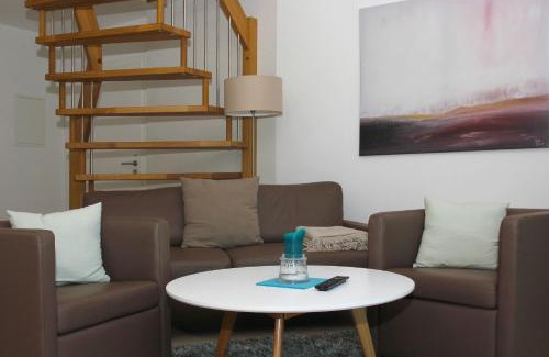 Lobbe Apartment | strandnahe FeWo mit Balkon, gratis Nutzung vom AHOI Erlebnisbad und Sauna in Sellin - Rex Rugia FeWo 13-6