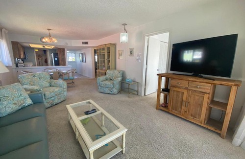Mid Island House | Strandview #304 - Beachfront condo with screened-in patio and amazing view!