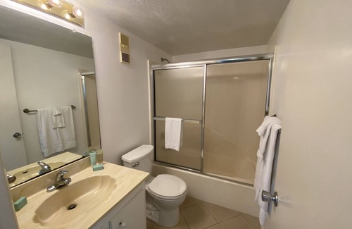 Mid Island Condo | Strandview #304 - Beachfront condo with screened-in patio and amazing view!