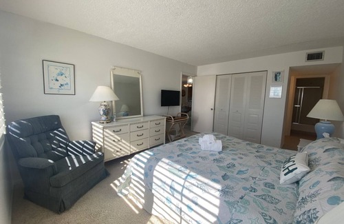 Mid Island Condo | Strandview #304 - Beachfront condo with screened-in patio and amazing view!