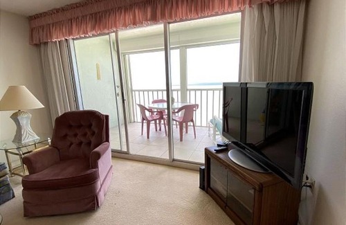 Mid Island House | Strandview #603 - Beachfront condo with screened-in patio and amazing view!