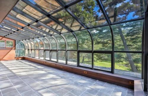 Jewett Center House | Stream-Side Atrium Home with Side Rooms & Pool Table