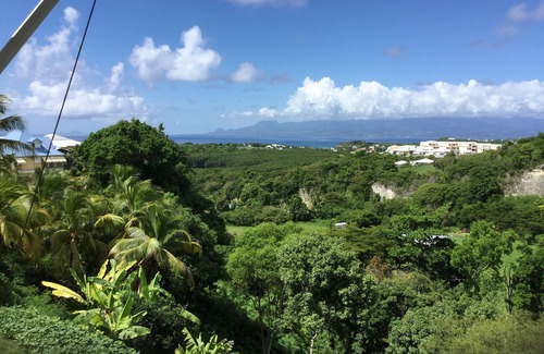 Saint Felix Apartment | Studio: A/C, loggia, sea and mountain view, Wi-Fi, 10 min from Sainte Anne Beach