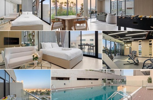 Discovery Gardens Apartment | Studio Al Furjan by STAY IN HOMES - Marina 12min - Self checkin - Metro - Parking