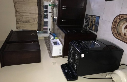 Portmore Apartment | Studio Apartment E4 with AC, Kitchen, Bathroom. Cozy intimate Apartment.
