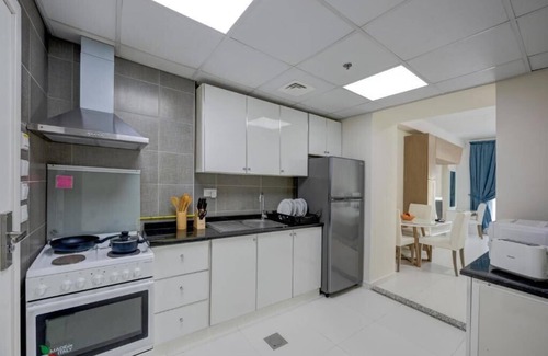 Dubai Investment Park Hotel | Studio Apartment Near Dunes Village Dip By Luxury Bookings