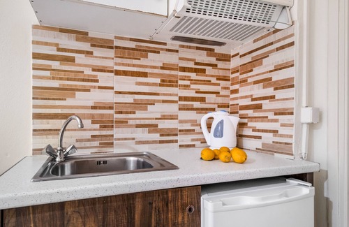 Nikiana Apartment | Studio Apartment "Nikiana Club - Studio 1" with Mountain View, Shared Pool & Wi-Fi