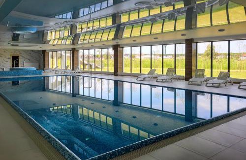 Dziwnow Apartment | Studio in Wellness Resort with Terrace & Parking by Noclegi Renters
