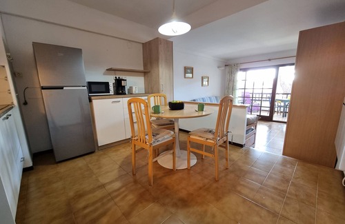 L'Escala Apartment | Studio 'La Escala Pueblo Pinos IC14' with Balcony, Shared Pool & A/C