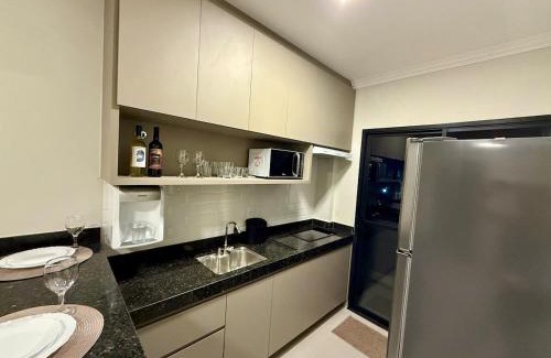Santa Monica Apartment | Studio Maia Aconchego e praticidade 190m da UFU