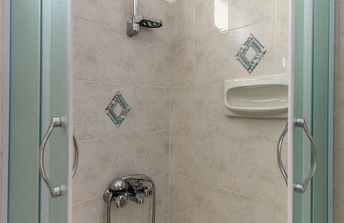 Vathy Apartment | Studio 'Veronis 2' with Sea View, Shared Pool & Wi-Fi