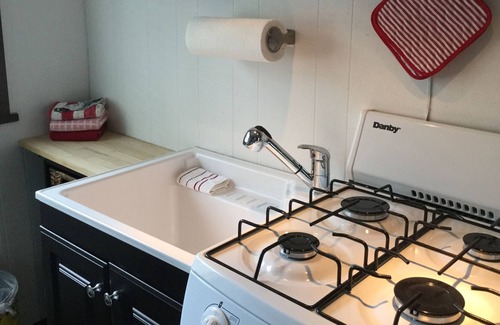 Gallatin Gateway Apartment | Studio with a kitchenette and a queen bed sleeps 2. 22 miles from ski resorts.