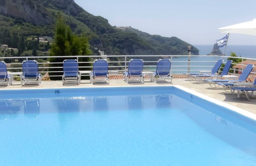 Agios Gordios Apartment | Studio with sea view, balcony, kitchenette, a/c, safe box
