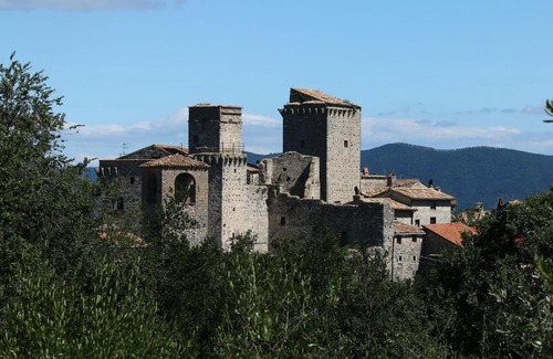 Barattano House | Stunning Castle in Gualdo Cattaneo with Shared Swimming Pool