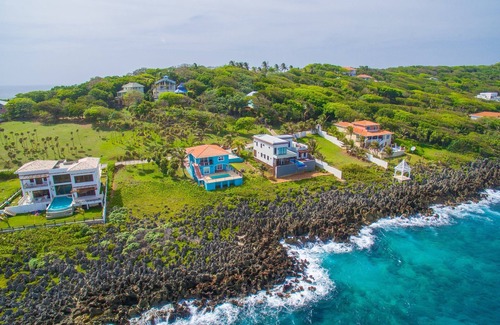 Lighthouse Estates House | Stunning Coral View Home with Oceanfront Pool by RedAwning