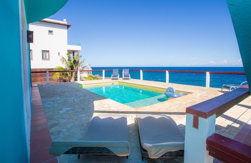 Lighthouse Estates House | Stunning Coral View Home with Oceanfront Pool by RedAwning