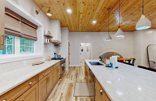 Foscoe Cottage | Stunning dog-friendly cottage with riverfront patio, hot tub, fire pit, & views