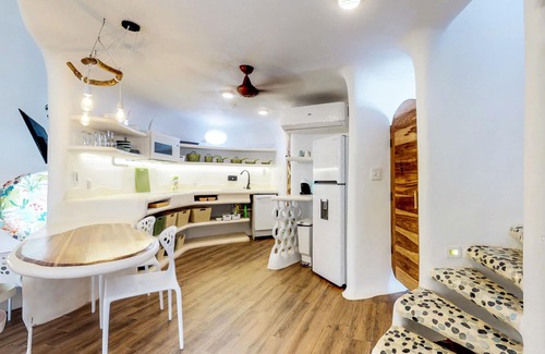 Cocoplum Villa | Stunning lagoon-front villa with pool, private hot tub, & AC
