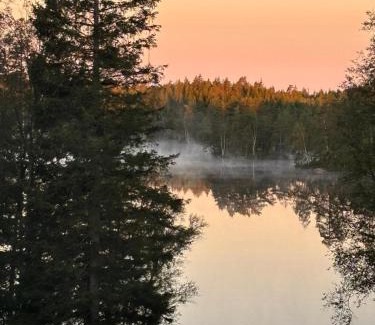 Sandared House | Stunning lakeside home with sauna surrounded by nature