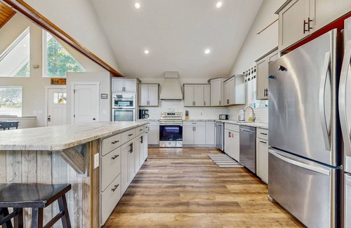 Lakeside Estates House | Stunning Lakeview Home with game room, fire pit, dock, & hot tub
