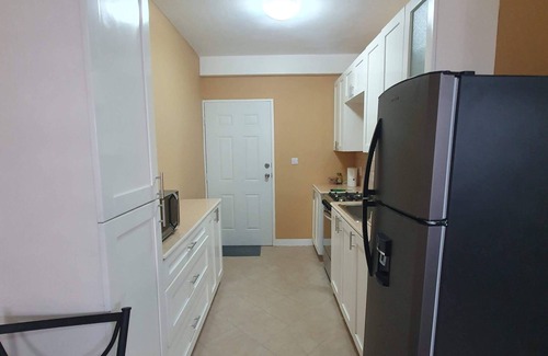 Roseau Apartment | Stunning Ocean & Pool View 2-Bedroom Apartment, 2 mins from the city.