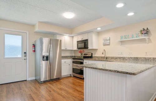 South Nags Head Condo | Stunning Top-Floor Oceanfront Condo! Pools & New Step in Shower and More!