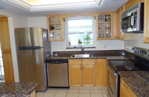 Cypress Lakes Estates House | Stunning Vibrant Vacation Rental with Large Pool And Heatable Spa