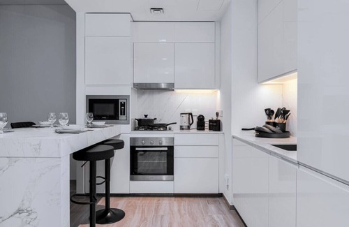 Dubai Apartment | Stylish 1BR | City & Creek Views, Near Downtown Dining & Attractions