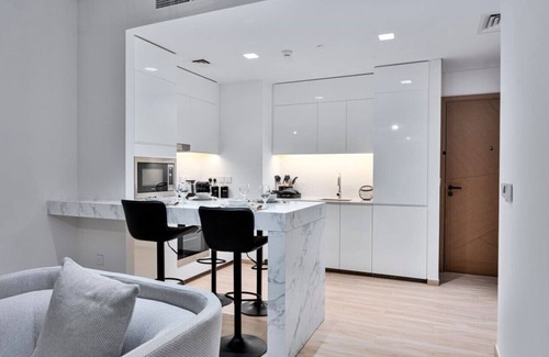 Dubai Apartment | Stylish 1BR | City & Creek Views, Near Downtown Dining & Attractions