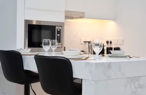 Dubai Apartment | Stylish 1BR | City & Creek Views, Near Downtown Dining & Attractions