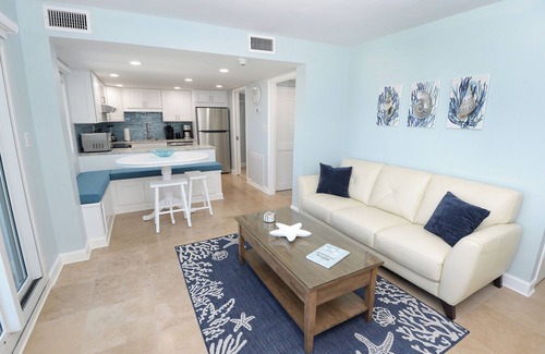 Sunnyside Condo | Stylish 2-Story Beachfront Condo with Gulf & Lake Views – Fully Renovated 2025