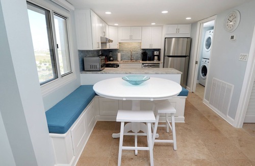 Sunnyside Condo | Stylish 2-Story Beachfront Condo with Gulf & Lake Views – Fully Renovated 2025