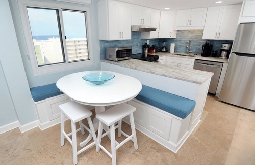 Sunnyside Condo | Stylish 2-Story Beachfront Condo with Gulf & Lake Views – Fully Renovated 2025
