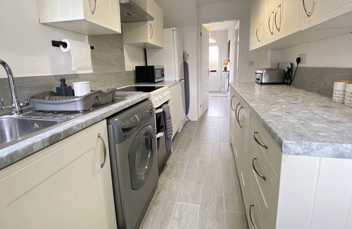 Doncaster House | Stylish, 3-bedroom home, with parking on premises