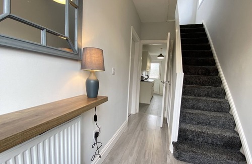 Doncaster House | Stylish, 3-bedroom home, with parking on premises