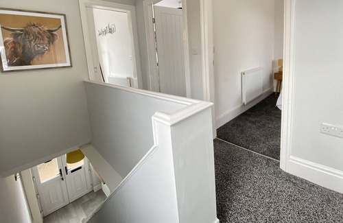 Doncaster House | Stylish, 3-bedroom home, with parking on premises