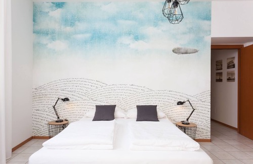 Riva del Garda Apartment | Stylish Apartment "RivApartmentsDowntowN - Travel" with a View of the Old Town of Riva del Garda, A/C & Wi-Fi