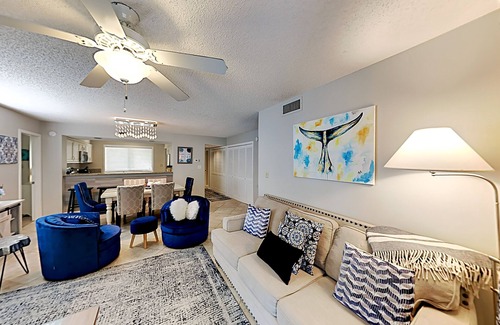 Arcadian Shores Condo | Stylish home with oversize deck & updated kitchen - walk to beach, pools, & gym
