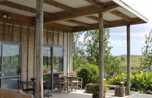 Kaiwaka House | Stylish modern bach with rural and water views