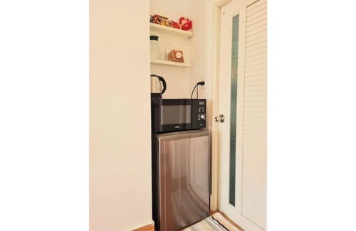 District 11 Apartment | Stylish Rooftop Studio Private Terrace Cozy Home